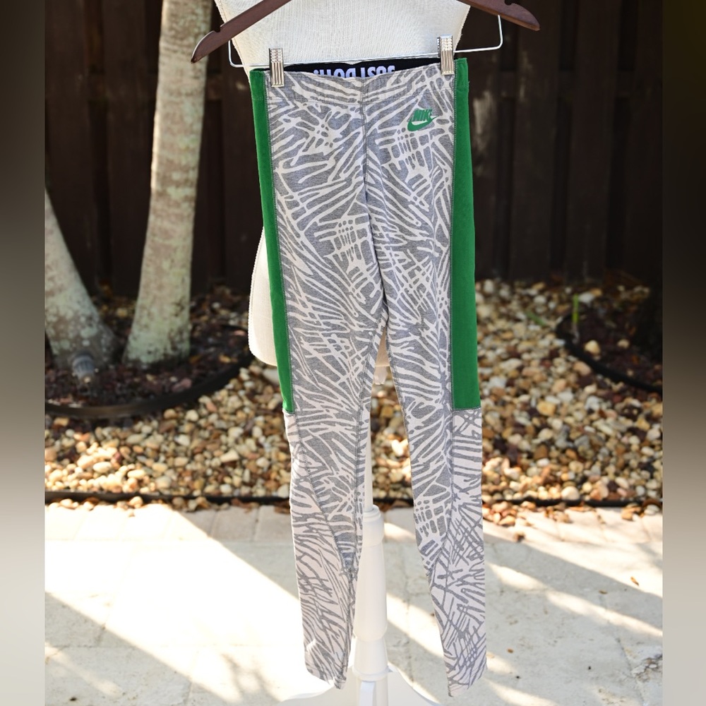 Nike cloth leggings with green side bar